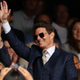 Tom Cruise waving to his adoring public